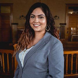 divorce lawyer with grey suit smiling
