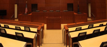 An empty courtroom before a criminal case hearing.