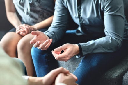 hands of a couple arguing divorce